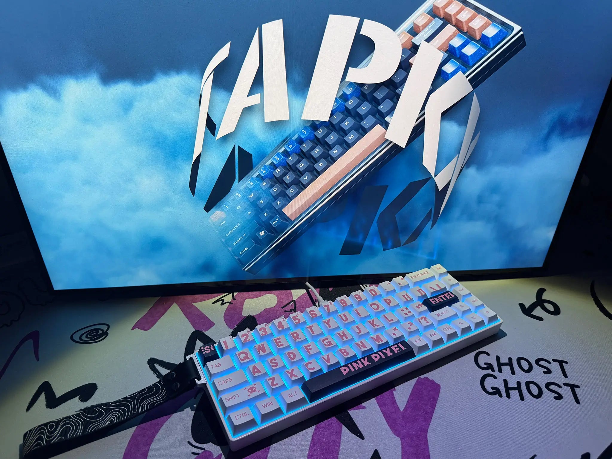 Tapkx Pink Pixel KX68 mechanical keyboard displayed in a playful, pixel-themed workspace