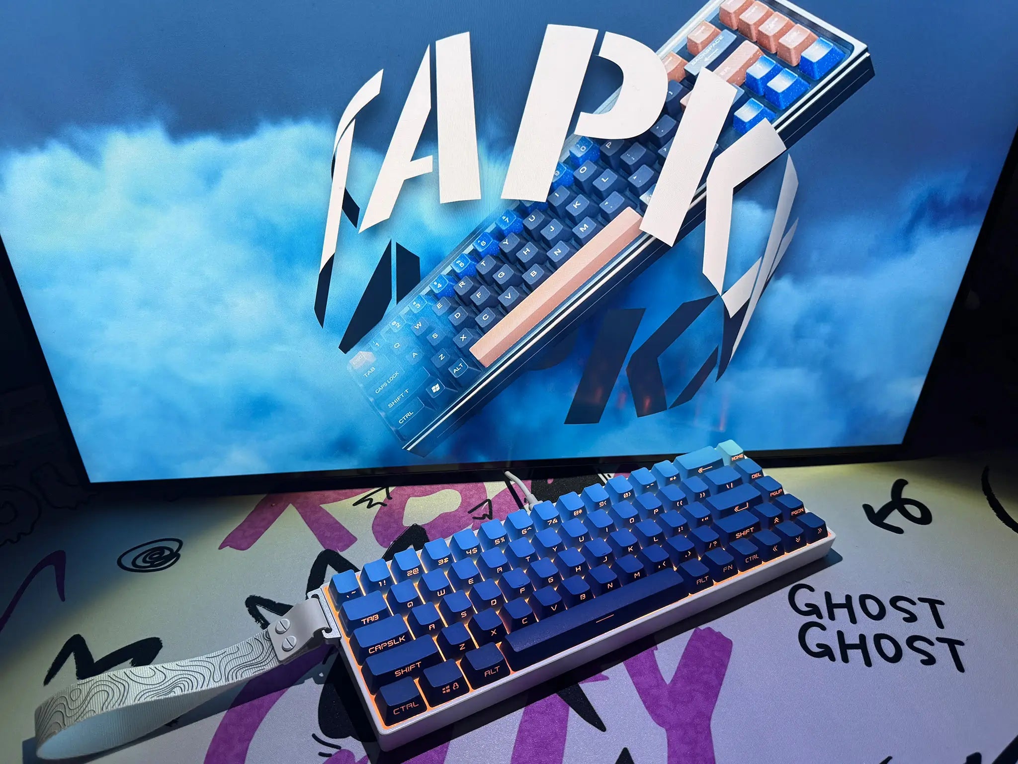 Tapkx Foggy Cobalt KX68 mechanical keyboard in a creative studio setup