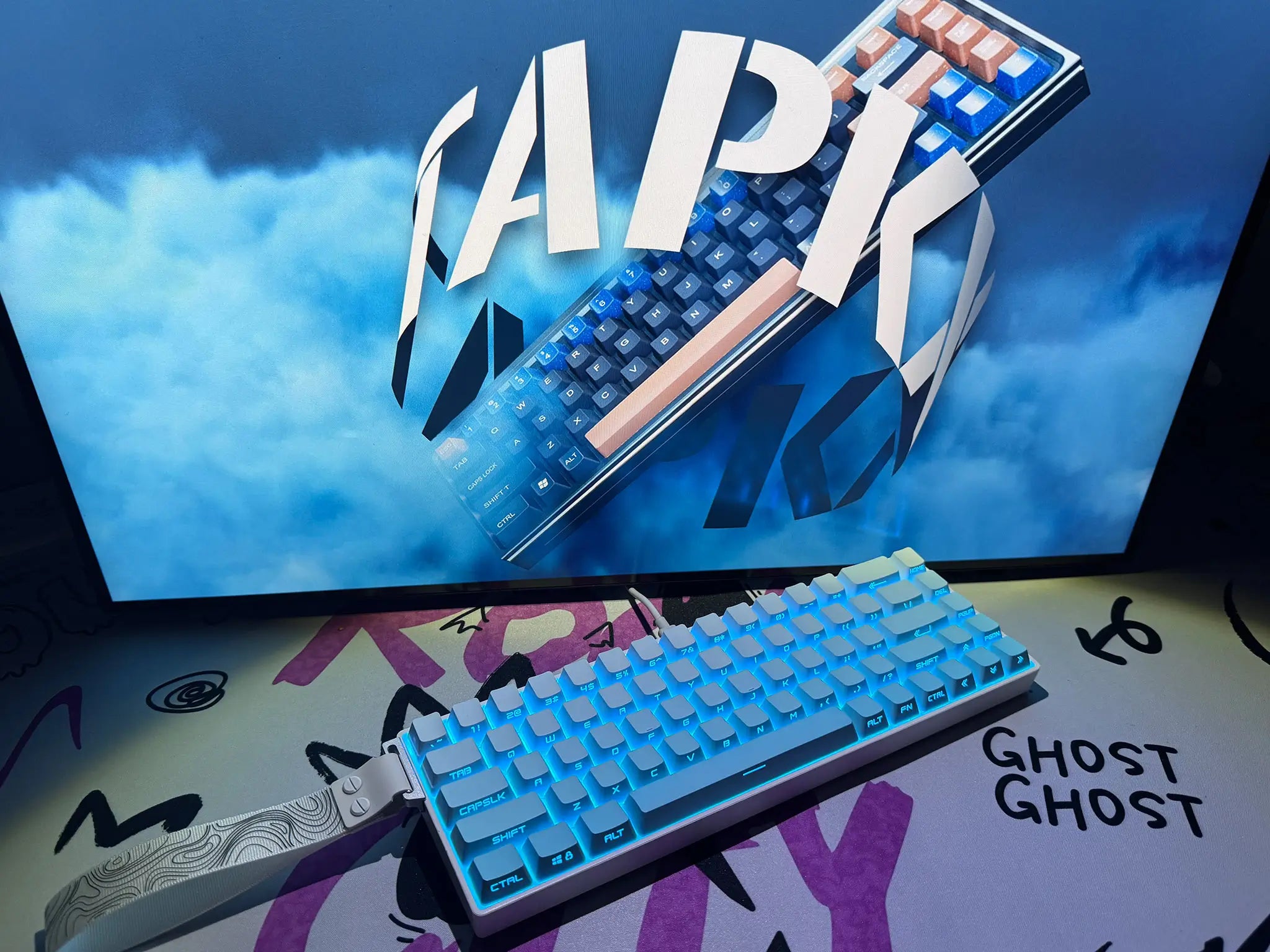 Tapkx Foggy Aqua KX68 mechanical keyboard displayed on a sleek glass desk