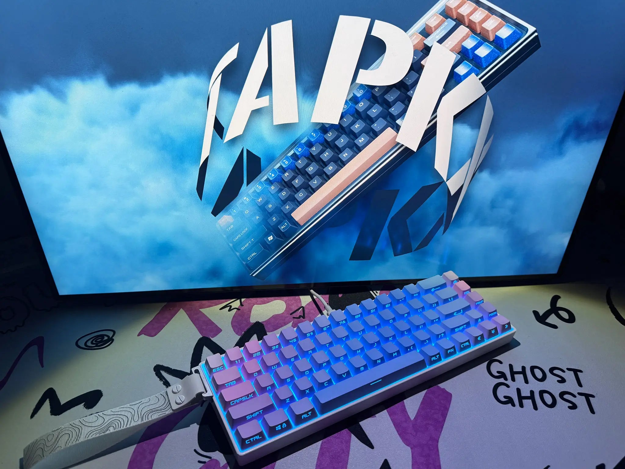 Tapkx Rainbow KX68 mechanical keyboard on a vibrant, color-filled desktop