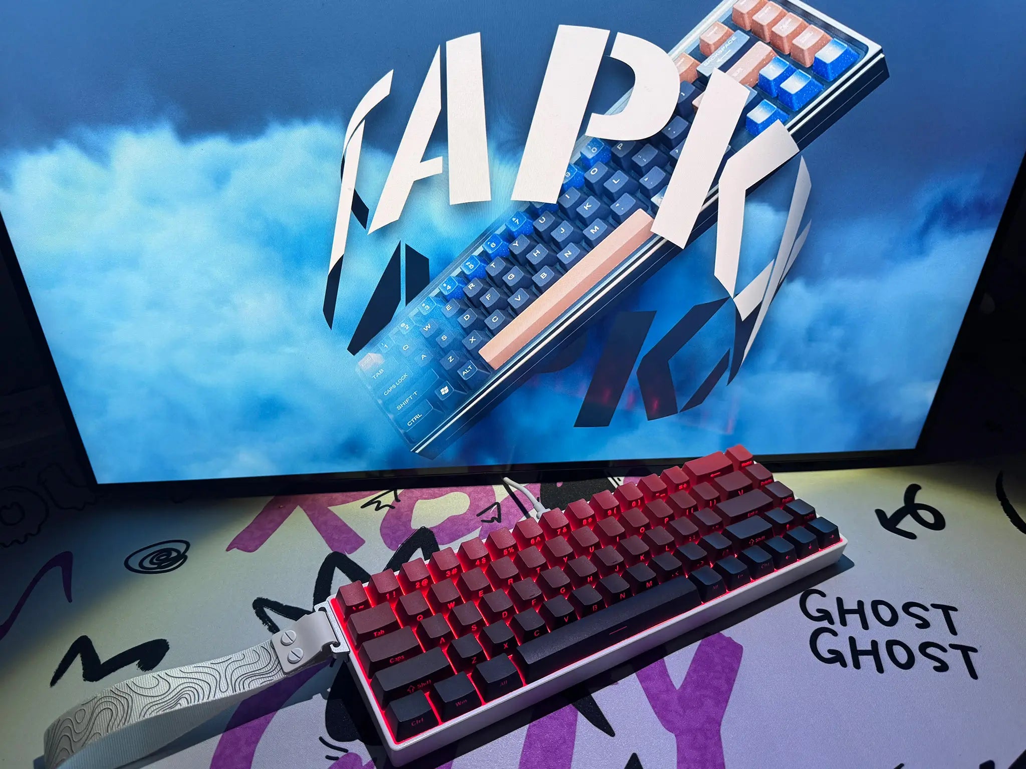 Tapkx Foggy Red KX68 mechanical keyboard in a vibrant gaming corner